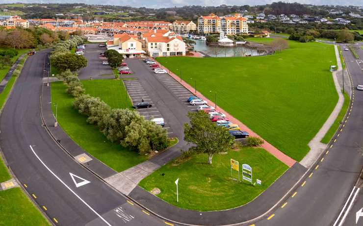 The empty 8547sqm site for sale in the Gulf Harbour Marine Village, in Auckland's Rodney district, is for sale by way of tender, closing June 27. Photo / Supplied