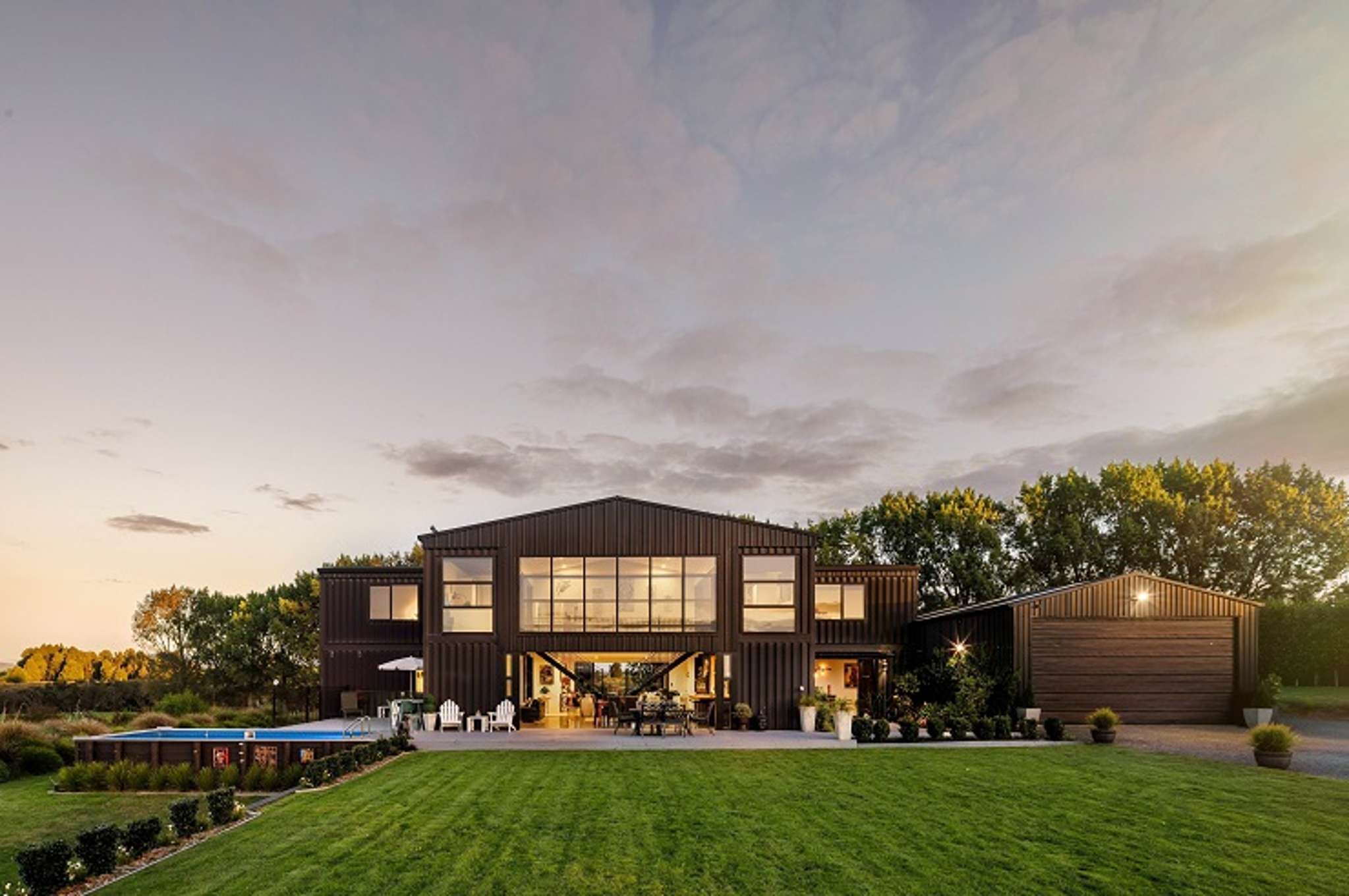 World-famous Kiwi house built from 12 shipping containers sells for over $2m