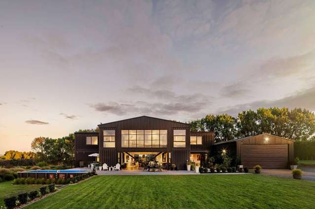 World-famous Kiwi house built from 12 shipping containers sells for over $2m