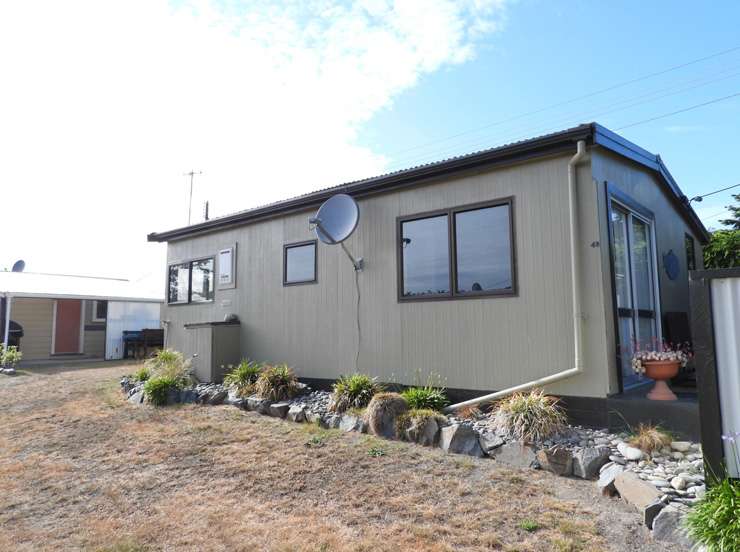 The do-up house at 139 Main Street, in Mataura, Gore, sits on a quarter acre section. Photo / Supplied