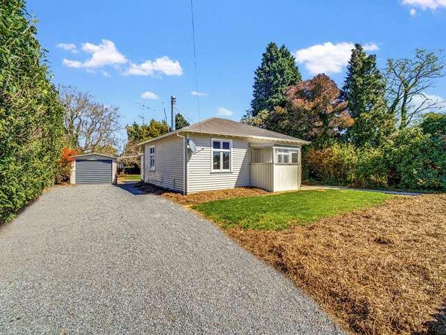 A Home with Lots of Potential and a Big Backyard