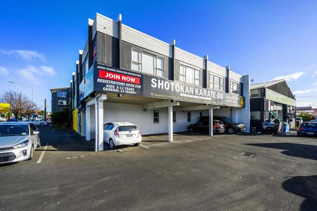 Prominent corner site investment with upside