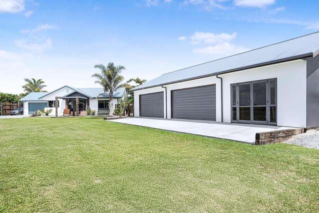 Serene Acreage Living with 3 Bay Shed!