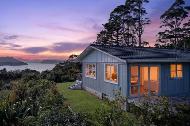 Above the harbour, views beyond compare
