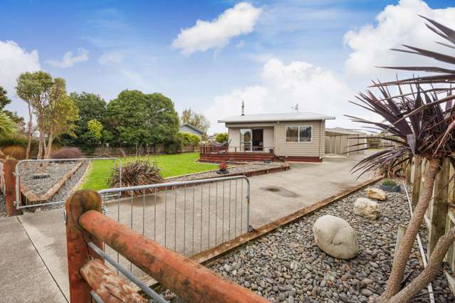 Garaging  Galore  & Modern Living!