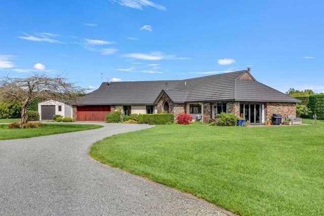 Superior Lifestyle with Supersized Garaging!