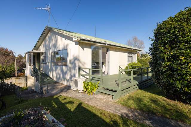 Solid 1950s Charmer with Sun Views & Potential
