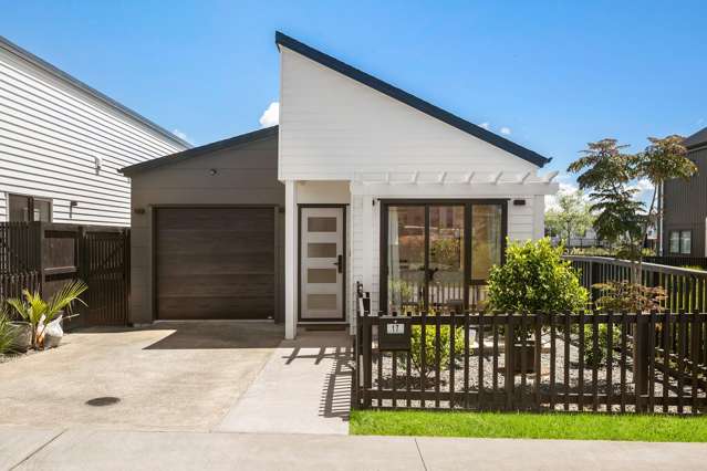 Bright Corner Home with Green Walkway at Your Door