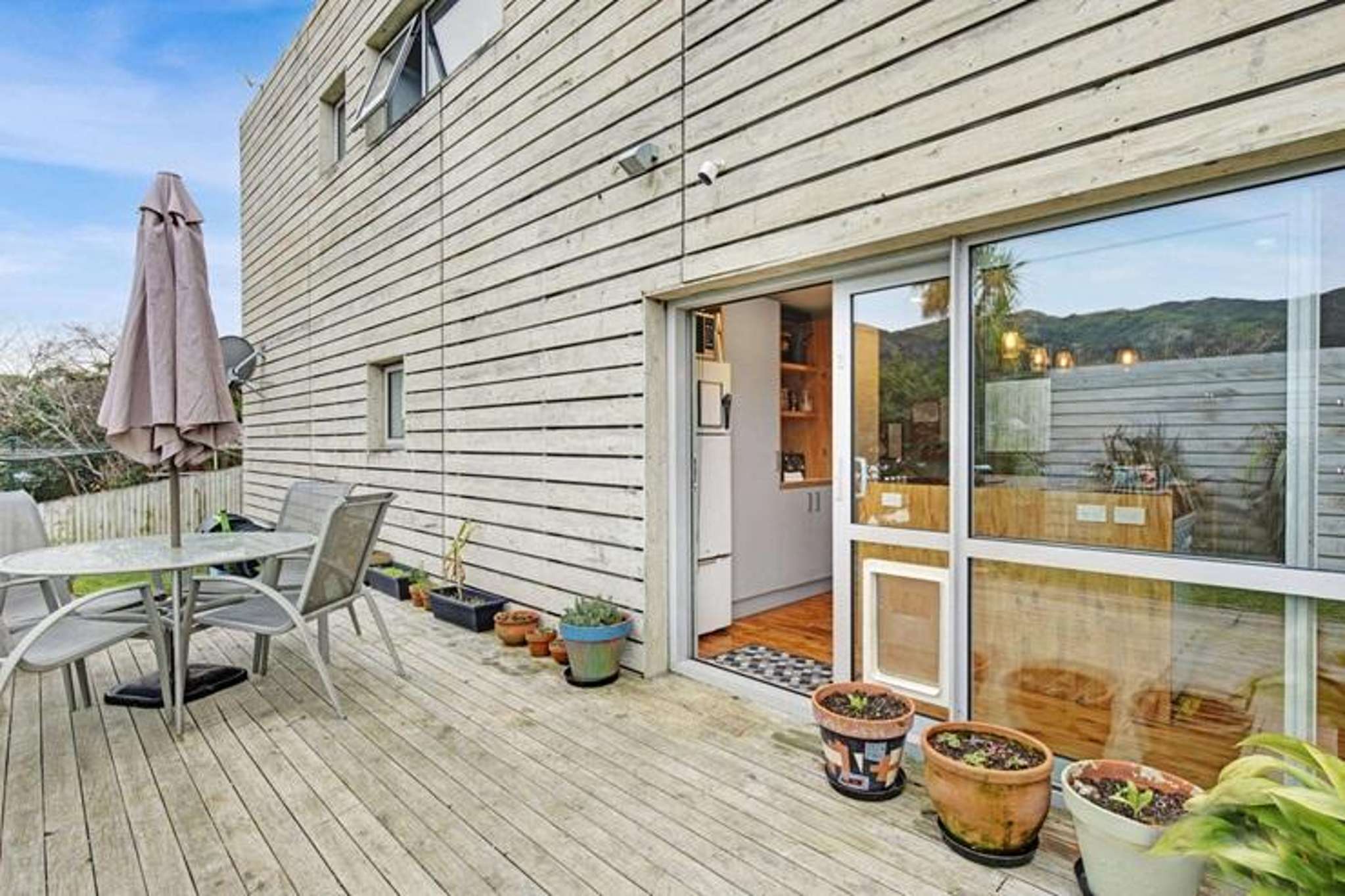 Couple selling quirky container home for $680,000 after elderly dogs struggle with stairs