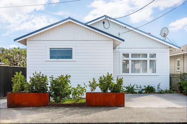 RENOVATED CHARACTER HOME + INCOME
