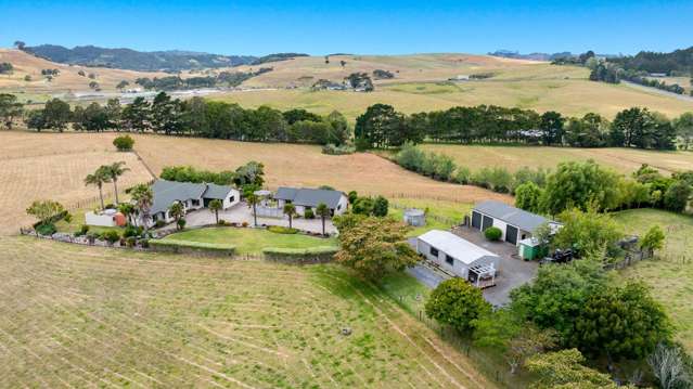 Two homes, modern outbuildings and four hectares