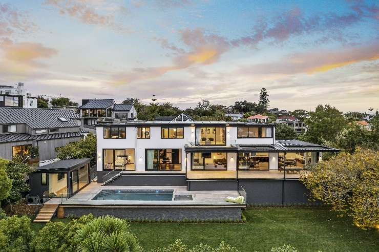 A modern, glass and steel mansion on Burwood Crescent, in Remuera, Auckland, sold for $20.6m in May 2023. The deal was brokered by Graham, Andrew and Ollie Wall, of Wall Real Estate. Photo / Supplied