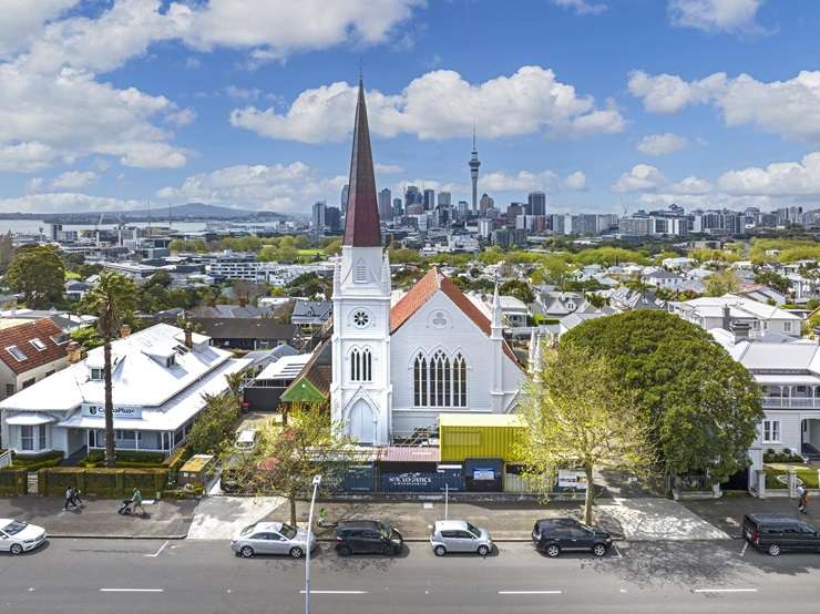 The heritage-protected 1889 church on School Road in Clive has been lovingly converted into a modern two-bedroom home. Photo / Supplied