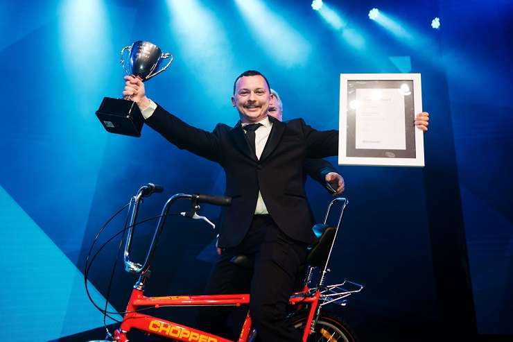 Harcourts Hawke's Bay agent Brayden Coldicutt, 28, in action at Harcourts National Auctioneer of the Year competition. Photo / Supplied