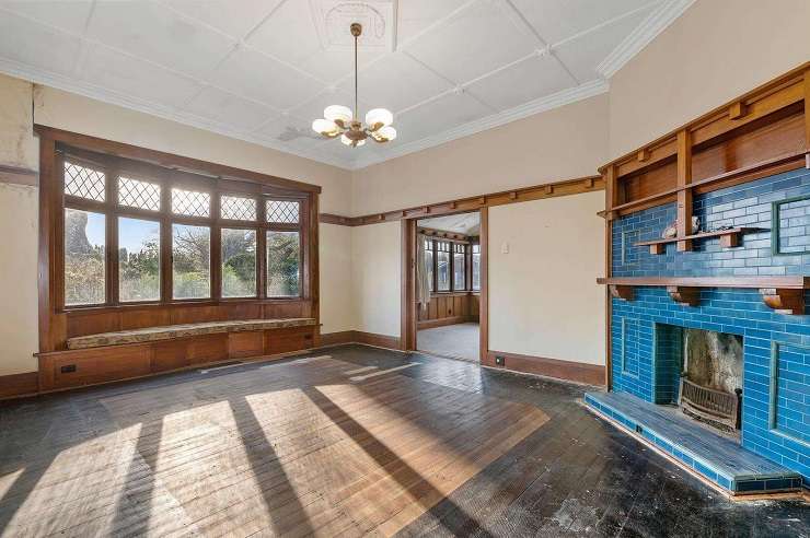 Real estate duo Callum and Anna Piesse decided to get in theme to sell a character 1920s home on Sophia Street, in Glenholme. Photo / Supplied