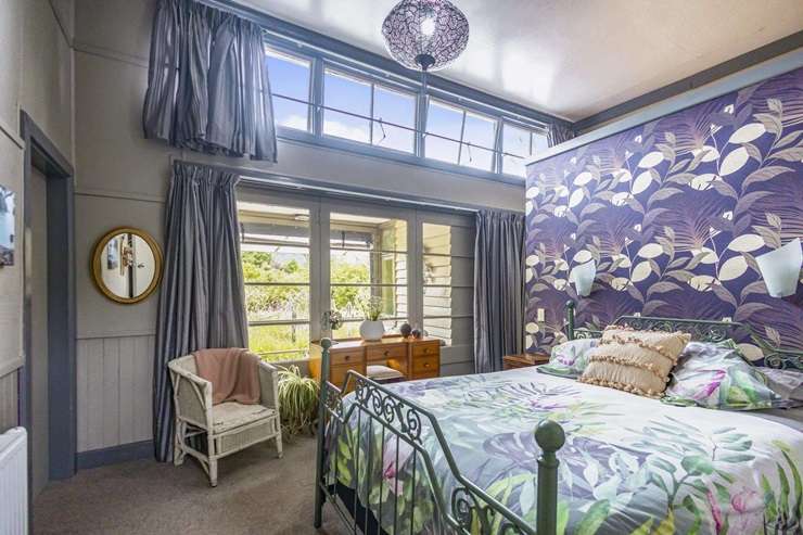 The former Taylorville School, in Greymouth, has been transformed into a massive eight-bedroom, four-bathroom home with two kitchens. Photo / Supplied