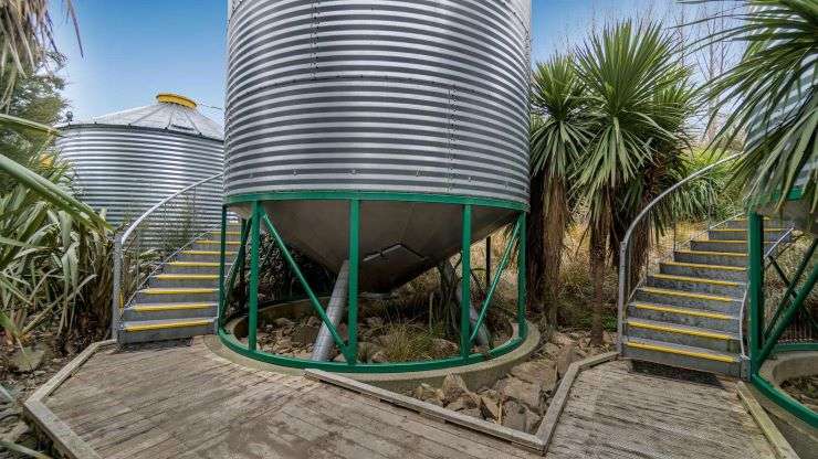 The land and buildings housing Little River’s SiloStay have been put on the market for sale. Photo / Supplied