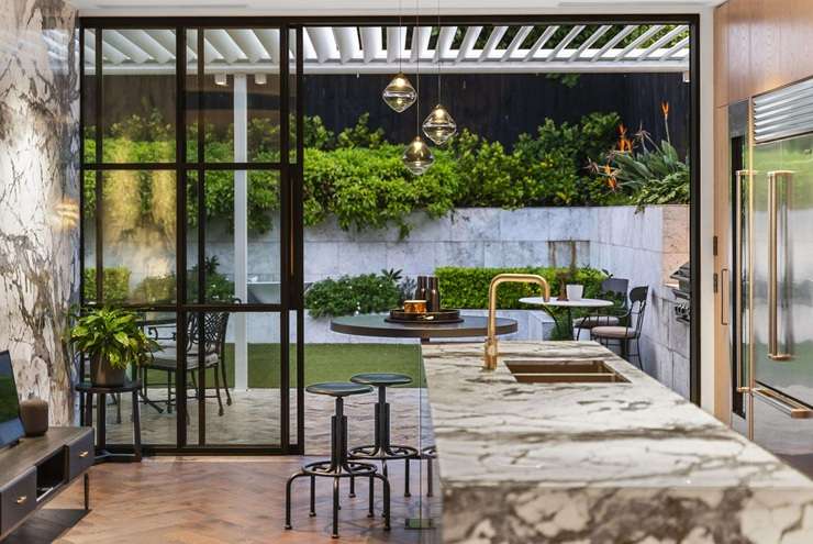 The two-bedroom home at 16 Dunedin Street, St Marys Bay, was completely rebuilt by its owners and is expecting over $6.5m. Photo / Supplied