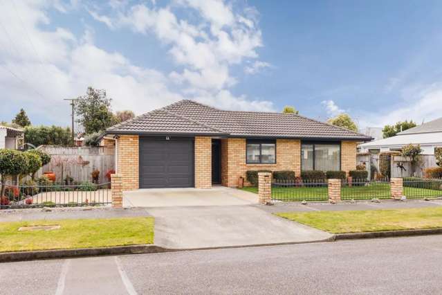 This stunning 3-bedroom townhouse with lovely gardens!