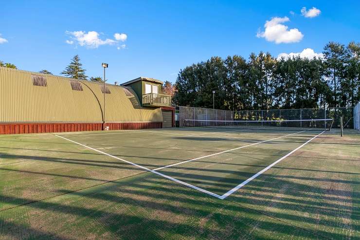 The 8070sqm property on Awanui Rise, in Ardmore, Papakura, had a purpose-built workshop that could house multiple cars. Photo / Supplied