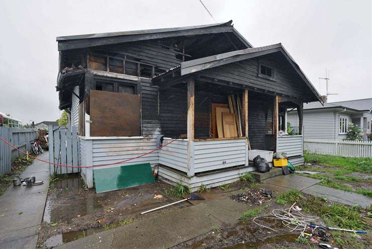 A three-bedroom fire-damaged home at Roscommon Road, in Clendon Park, Auckland, goes to auction at the end of the month with a <img reserve. Photo / Supplied