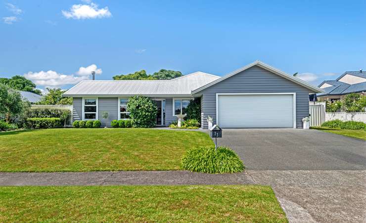 A three-bedroom brick home on Potae Avenue, in Lytton West, Gisborne, proved popular in the auction room. Photo / Supplied