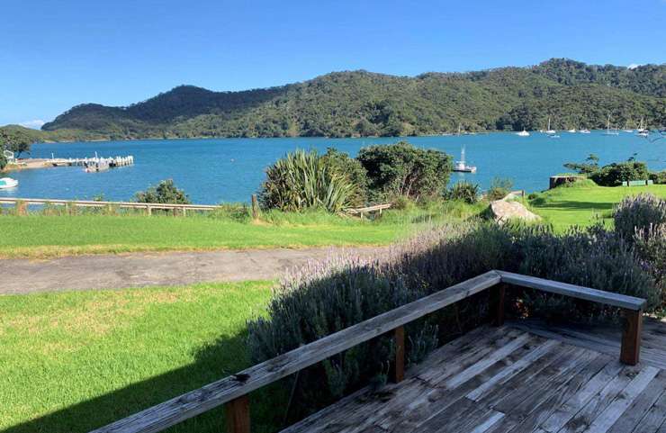 The four-bedroom house on Whangaparapara Road, Great Barrier Island, was on the market at <img.4m. Photo / Supplied