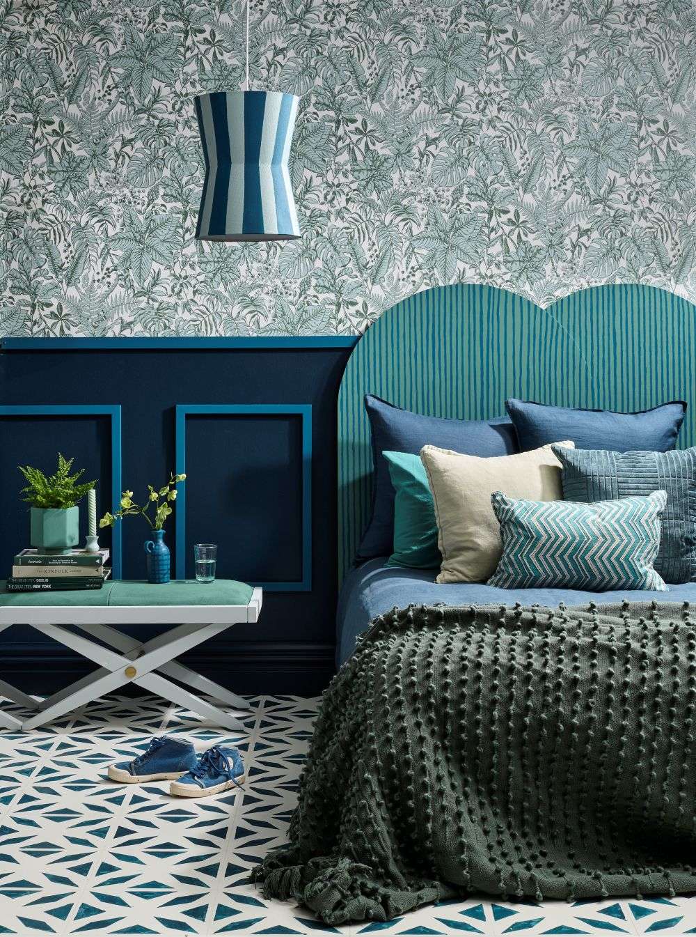 A dramatic wallpaper can be a simple way to add a maximalist feature and bold colour to your room.