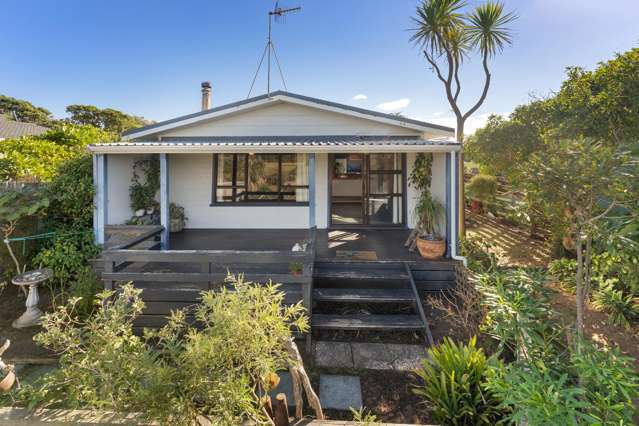 Cute Coastal Retreat with Stream Access and Mountain Views
