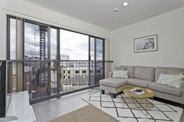 Sunlit City Living: Spacious Three-Bedroom Gem on Queen Street